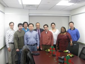 Computational Medicine Team Gathered Around Conference Table in 2013