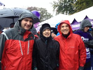 Isidore Rigoutsos and Colleagues Posing in Rain at PurpleStride