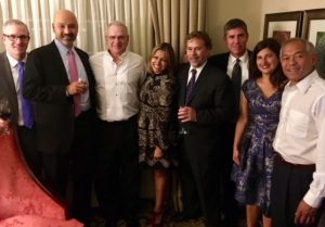 Brendan Carr and Colleagues Posing at Formal Event
